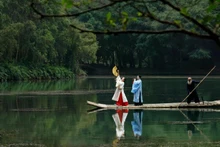 Traditional Vietnamese costumes presented by Hoa Lu Legacy on the Ngo Dong River, Ninh Binh.