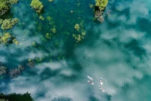 Stand-up paddleboarding (SUP) on Lan Ty Lake (Lang Son). (Photo: MANH PHAM)