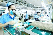 Rhythm Vietnam Co., Ltd. (Hanoi), a Japanese enterprise specialising in precision components, moulds and electronic circuit boards. Photo: THANH DAT