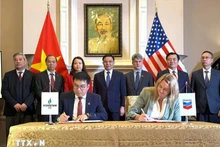 The MoU signing ceremony between the Binh Son Refining and Petrochemical JSC and US energy group Chevron (Photo: VNA)