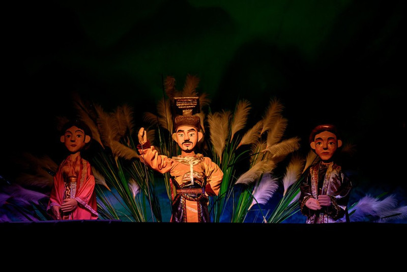 A puppetry performance by artists from the Thang Long Puppetry Theatre