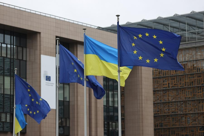 Flags of European Union (EU) and Ukraine are seen at the EU headquarters in Brussels, Belgium, February 24, 2025. (Photo: Xinhua)