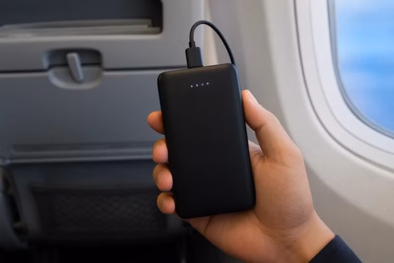 Air travellers required to keep power banks in carry-on bags from July.