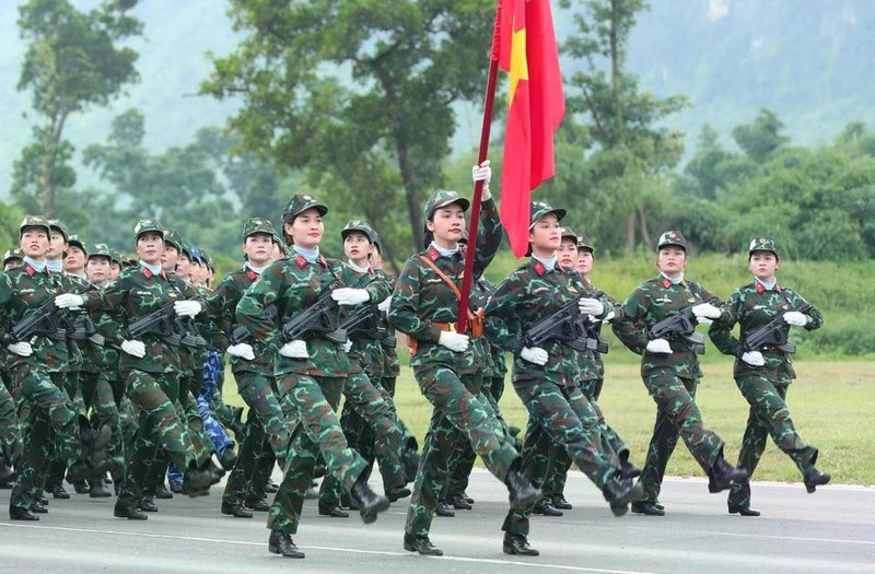 Female officers from multiple forces at the rehearsal. (Photo: VNA)