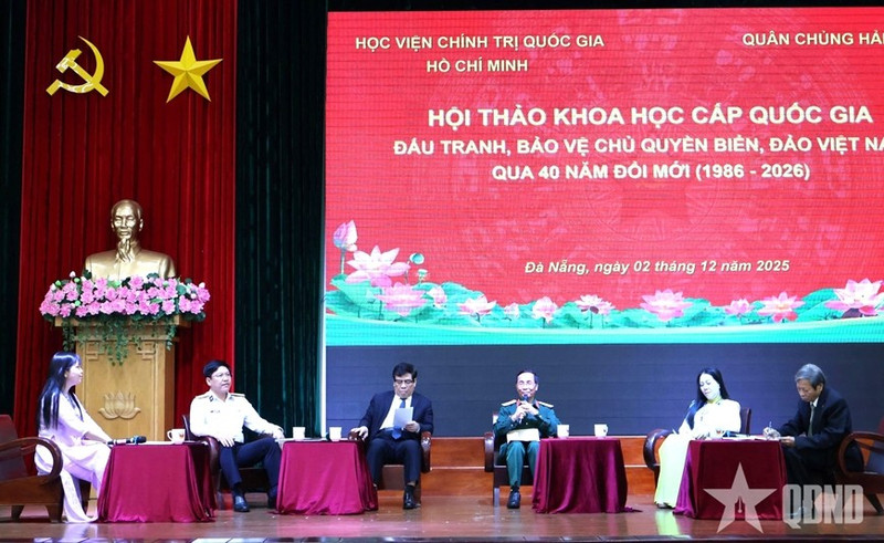 Participants join a panel discussion at the event (Photo: qdnd.vn)
