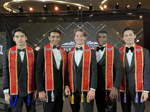 The top five at the Manhunt International 2025 competition. A French contestant (centre) won the pageant, while Vietnamese representative Nguyen Vu Linh (right) was the fourth runner-up. (Photo: Courtesy of Manhunt International 2025)