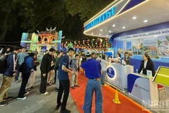 Visitors line up to take part in experiences at the Festival.