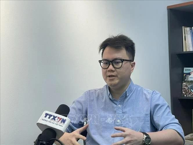 Enzo Sim Hong Jun, a Malaysian researcher specialising in Southeast Asian history and defence, grants an interview to the Vietnam News Agency. (Photo: VNA)