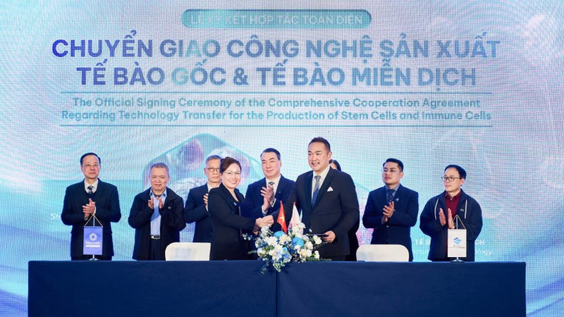 The signing ceremony between the two units.