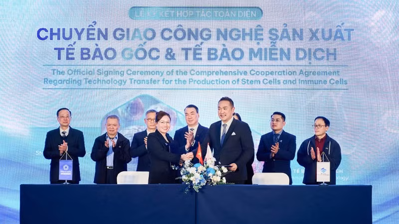 The signing ceremony between the two units.