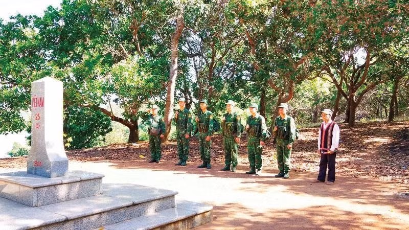 Elder Ksor Bong often patrols the border adjacent to Cambodia together with border guards.