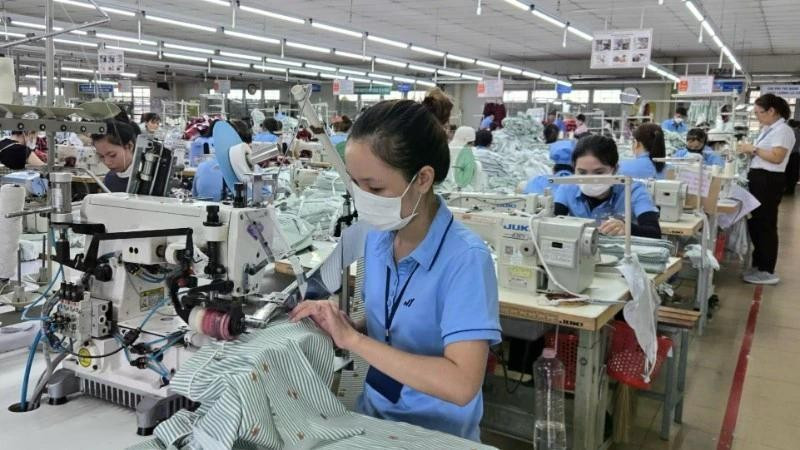 Garment production for export at Hoa Thi Garment Factory, Quang Ngai province. (Photo: MINH KHOI)