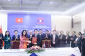 Minister of Culture, Sports and Tourism Lam Thi Phuong Thanh and Deputy Head of the Central Propaganda and Training Commission Vansy Kuamua exchange the cooperation memorandum for the 2026-2030 period. (Photo: VNA)