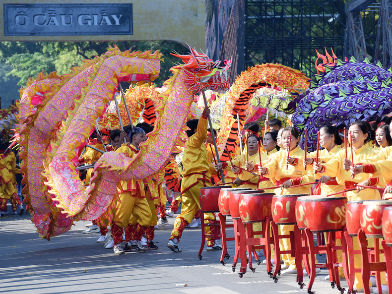 : A dragon dance performance by representatives of districts in Hanoi.