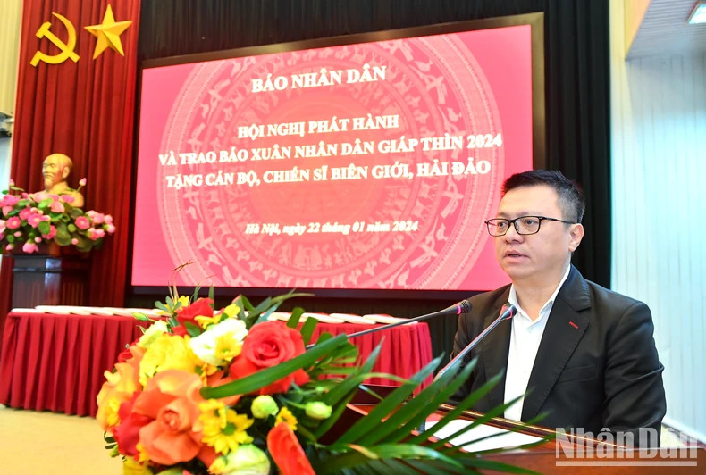 Editor in Chief of Nhan Dan Newspaper Le Quoc Minh speaking at the event. (Photo: NDO)