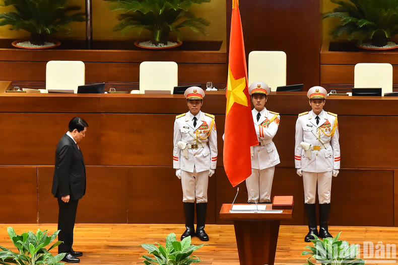 President Luong Cuong performs the national flag salute during the inauguration ceremony. President Luong Cuong performs the national flag salute during the inauguration ceremony.