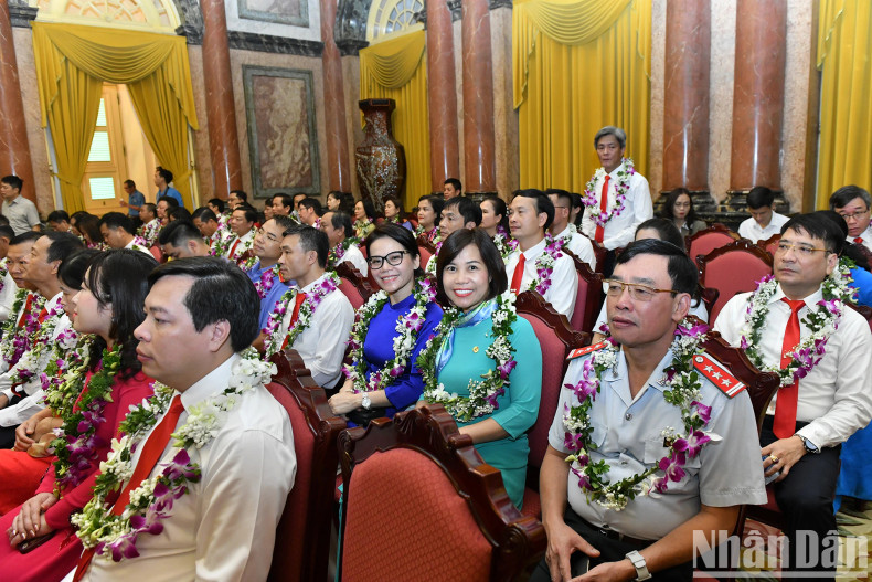 Delegates attend the meeting. Delegates attend the meeting.