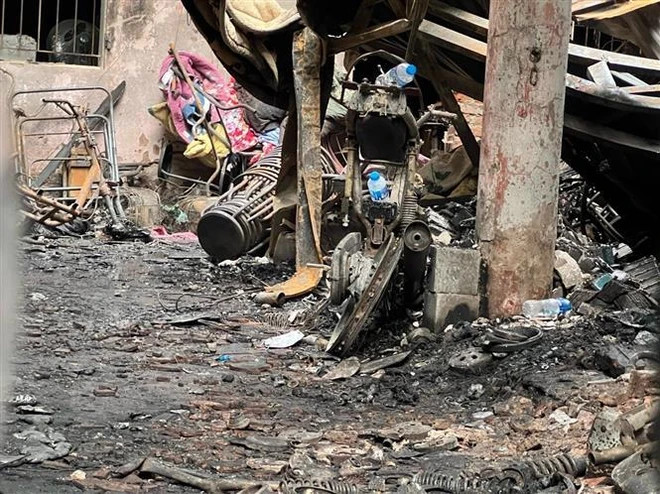 The scene of the house fire in Trung Hoa ward of Cau Giay district, Hanoi, on May 24 (Photo: VNA)