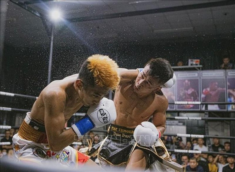 The decisive knockout punch was delivered by boxer Tran Van Thao. (Photo: VNA) The decisive knockout punch was delivered by boxer Tran Van Thao. (Photo: VNA)