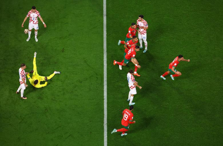 Morocco's Achraf Dari celebrates scoring their first goal with Jawad El Yamiq, Youssef En-Nesyri and teammates. (Photo: REUTERS) Morocco's Achraf Dari celebrates scoring their first goal with Jawad El Yamiq, Youssef En-Nesyri and teammates. (Photo: REUTERS)