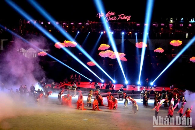 The stage is filled with colourful lights. (Photo: QUOC HONG)