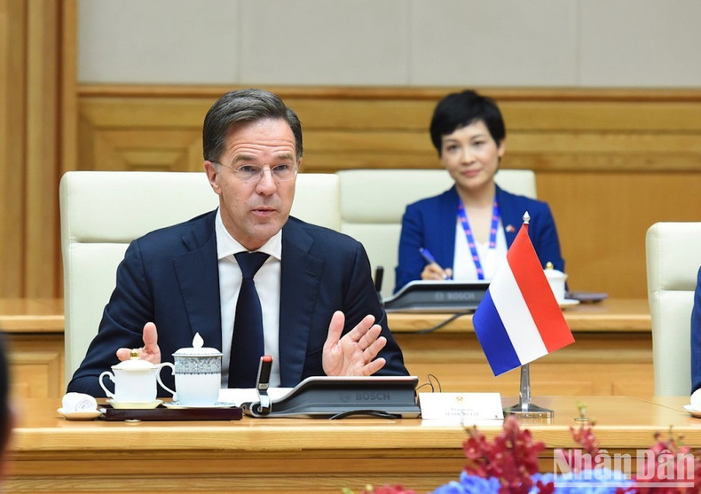[In Pictures] PM Pham Minh Chinh chairs welcome ceremony for Dutch PM Mark Rutte ảnh 13