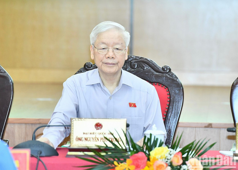 Party General Secretary Nguyen Phu Trong attends the meeting with voters in Hanoi.