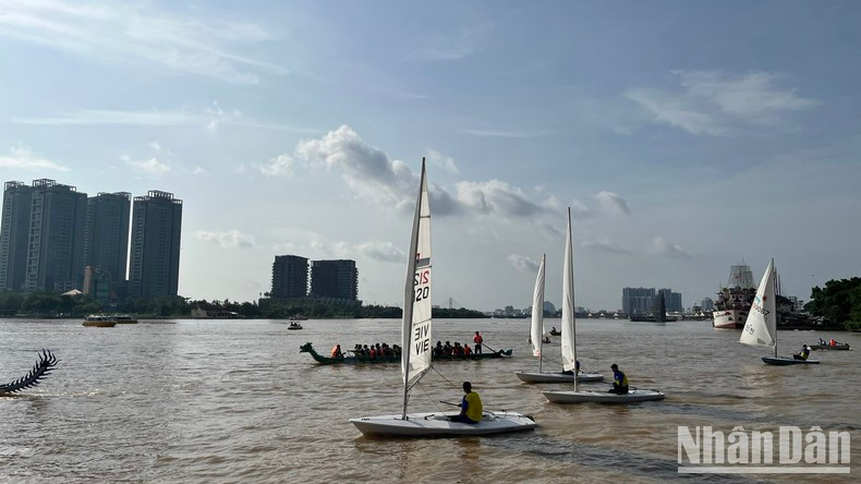 A sailboat parade on the Saigon River. A sailboat parade on the Saigon River.