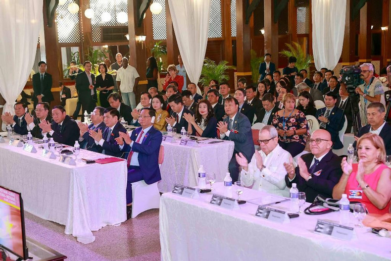 Delegates attend the forum. (Photo: DOAN TAN)