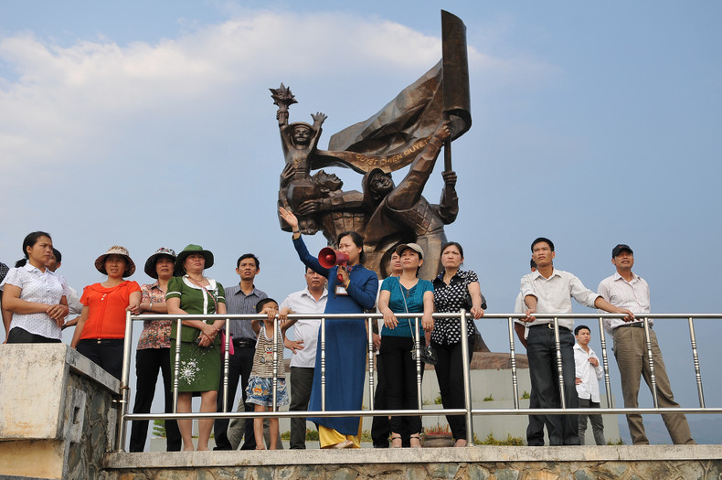Tourists take a panoramic view of Dien Bien Phu City from the Dien Bien Phu Victory Monument.