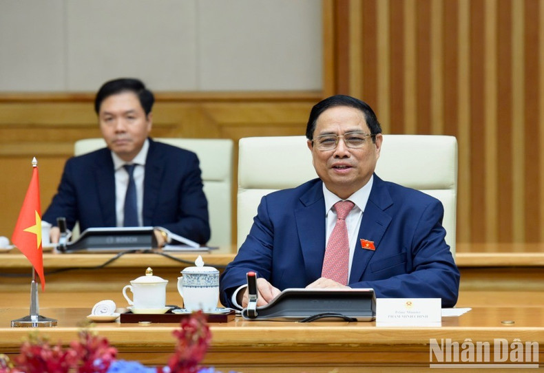 [In Pictures] PM Pham Minh Chinh chairs welcome ceremony for Dutch PM Mark Rutte ảnh 10