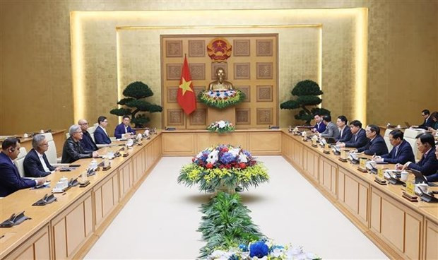 At the meeting between Prime Minister Pham Minh Chinh and President and CEO of Nvidia. (Photo: VNA) At the meeting between Prime Minister Pham Minh Chinh and President and CEO of Nvidia. (Photo: VNA)