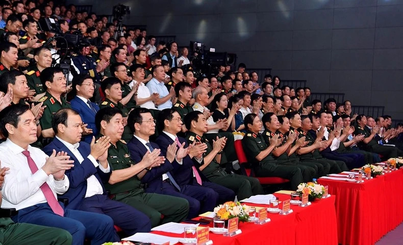 Delegates attend the art programme.