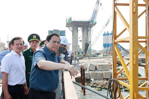 PM Chinh inspects the project to build a bridge crossing Thuan An estuary. (Photo: VNA) PM Chinh inspects the project to build a bridge crossing Thuan An estuary. (Photo: VNA)