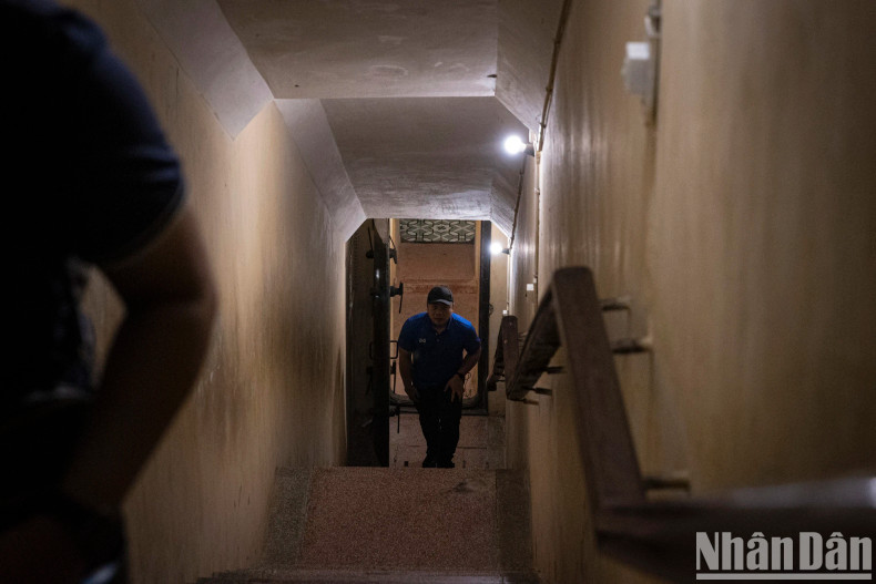 The D67 bunker (Central Military Commission bunker) was built alongside the D67 house in 1967. It is 9m deep and heavily fortified to withstand bombing, with three levels of stairs for access. The D67 bunker (Central Military Commission bunker) was built alongside the D67 house in 1967. It is 9m deep and heavily fortified to withstand bombing, with three levels of stairs for access.