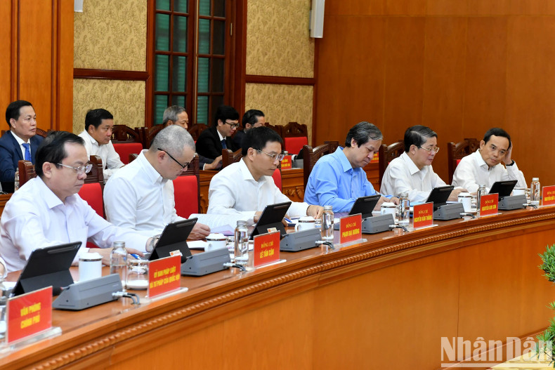 Delegates attend the meeting.