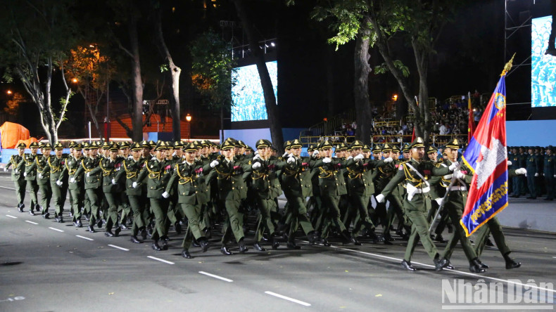 The Royal Cambodian Army also march in the rehearsal, symbolising international friendship, solidarity, and cooperation on the occasion of the 50th anniversary of national reunification.