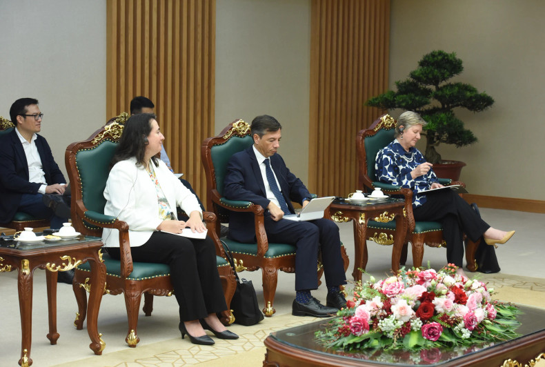 Delegation members accompanying Mariam J. Sherman attend the meeting.
