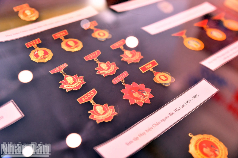 A collection of Uncle Ho’s Good Children badges from various historical periods draws significant interest.