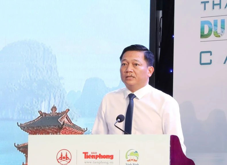 Vice Chairman Nguyen Cao Son delivers remarks at the seminar. (Photo: DUC PHUONG)