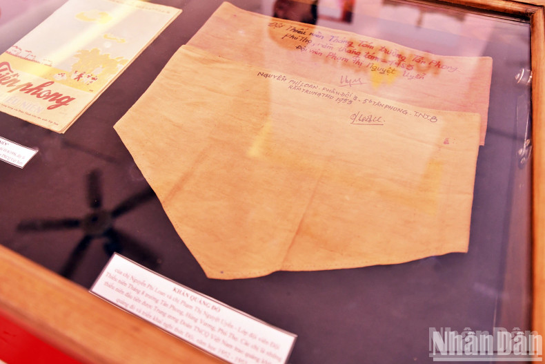 The first red scarves presented to young members of the National Salvation Children's Brigade.