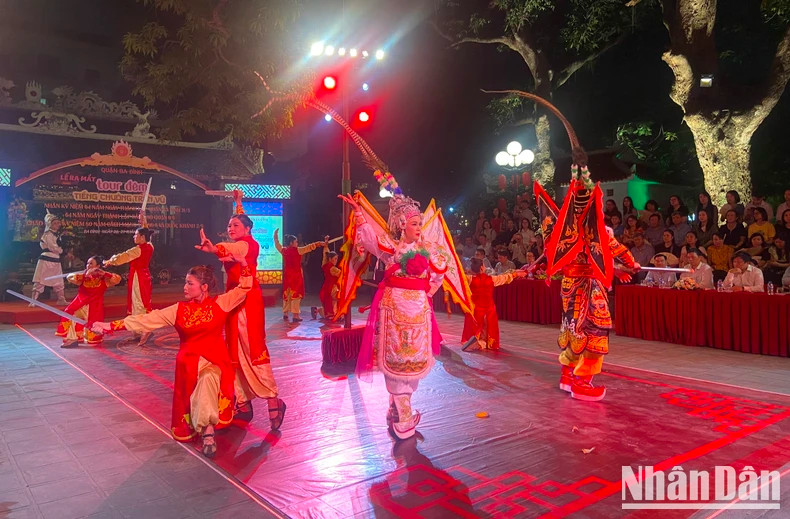 A scene from the performance recounting the story of Saint Huyen Thien Tran Vu. A scene from the performance recounting the story of Saint Huyen Thien Tran Vu.