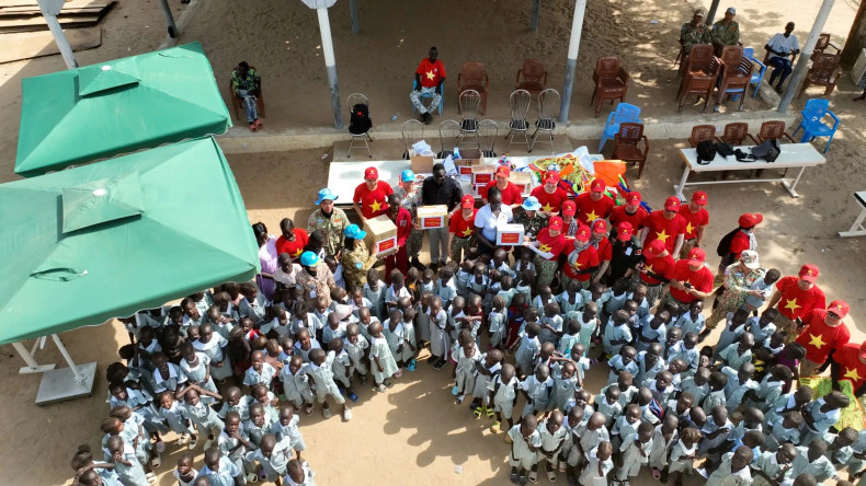 Abyei children gather with Vietnamese soldiers to celebrate International Children’s Day. Abyei children gather with Vietnamese soldiers to celebrate International Children’s Day.