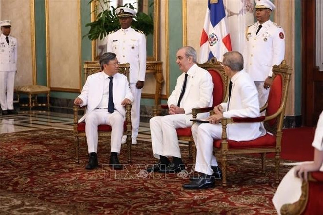 President Luis Rodolfo Abinader Corona's reception for Vietnamese Ambassador Le Quang Long (Photo: VNA) President Luis Rodolfo Abinader Corona's reception for Vietnamese Ambassador Le Quang Long (Photo: VNA)