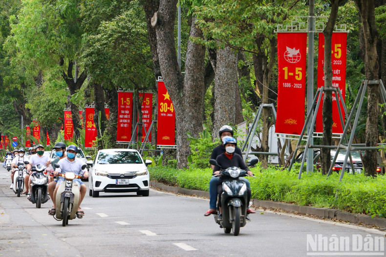 Hoang Dieu Street is decorated with large banners and posters honouring the great national holiday.