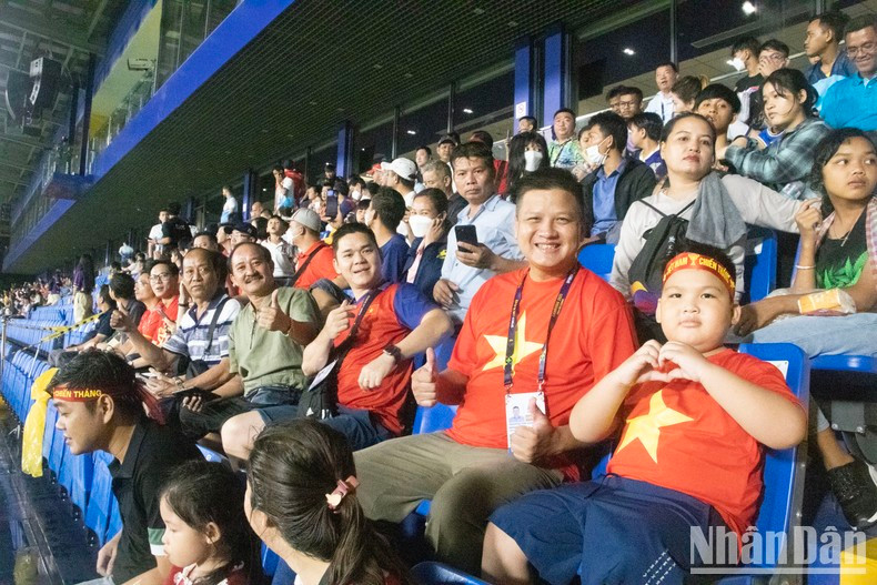 Vietnamese football fans at the match. Vietnamese football fans at the match.