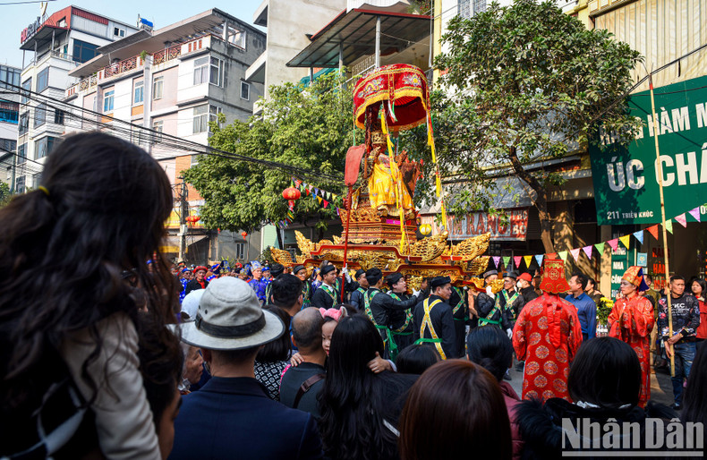 A palanquin procession at the festival. A palanquin procession at the festival.