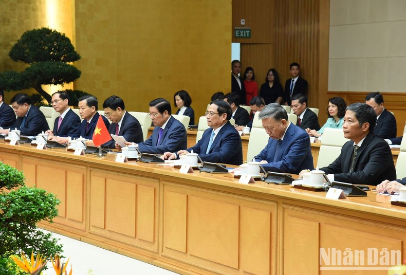 Prime Minister Pham Minh Chinh and members of the Vietnamese Government at the meeting. Prime Minister Pham Minh Chinh and members of the Vietnamese Government at the meeting.