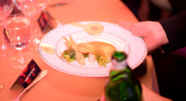 Fish and scallop served with telosma cordata, pumpkin flowers, lettuce and white radish