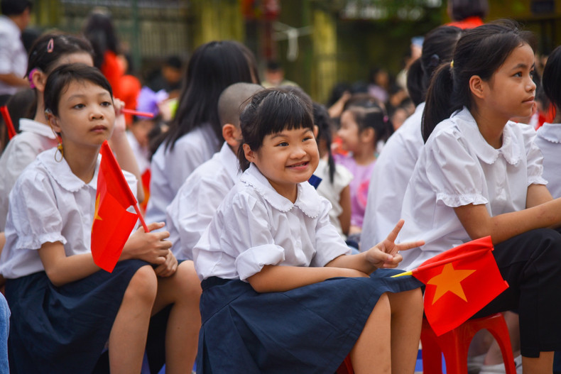 The joy of schoolchildren during the opening ceremony of the new academic year.